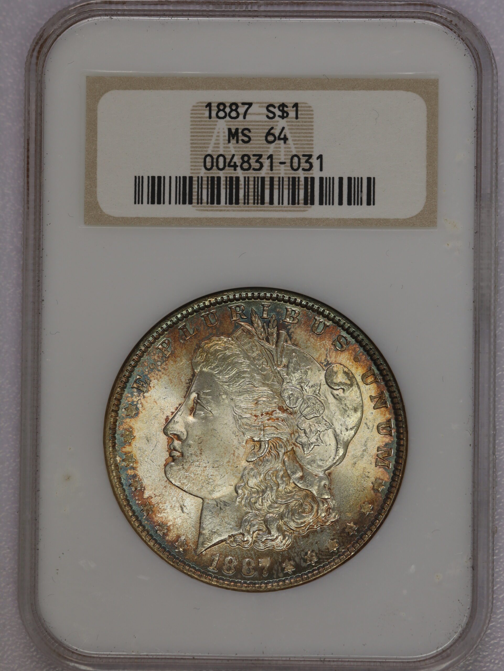 1887 Morgan Silver Dollar NGC MS64 Old Fatty Rainbow Toning