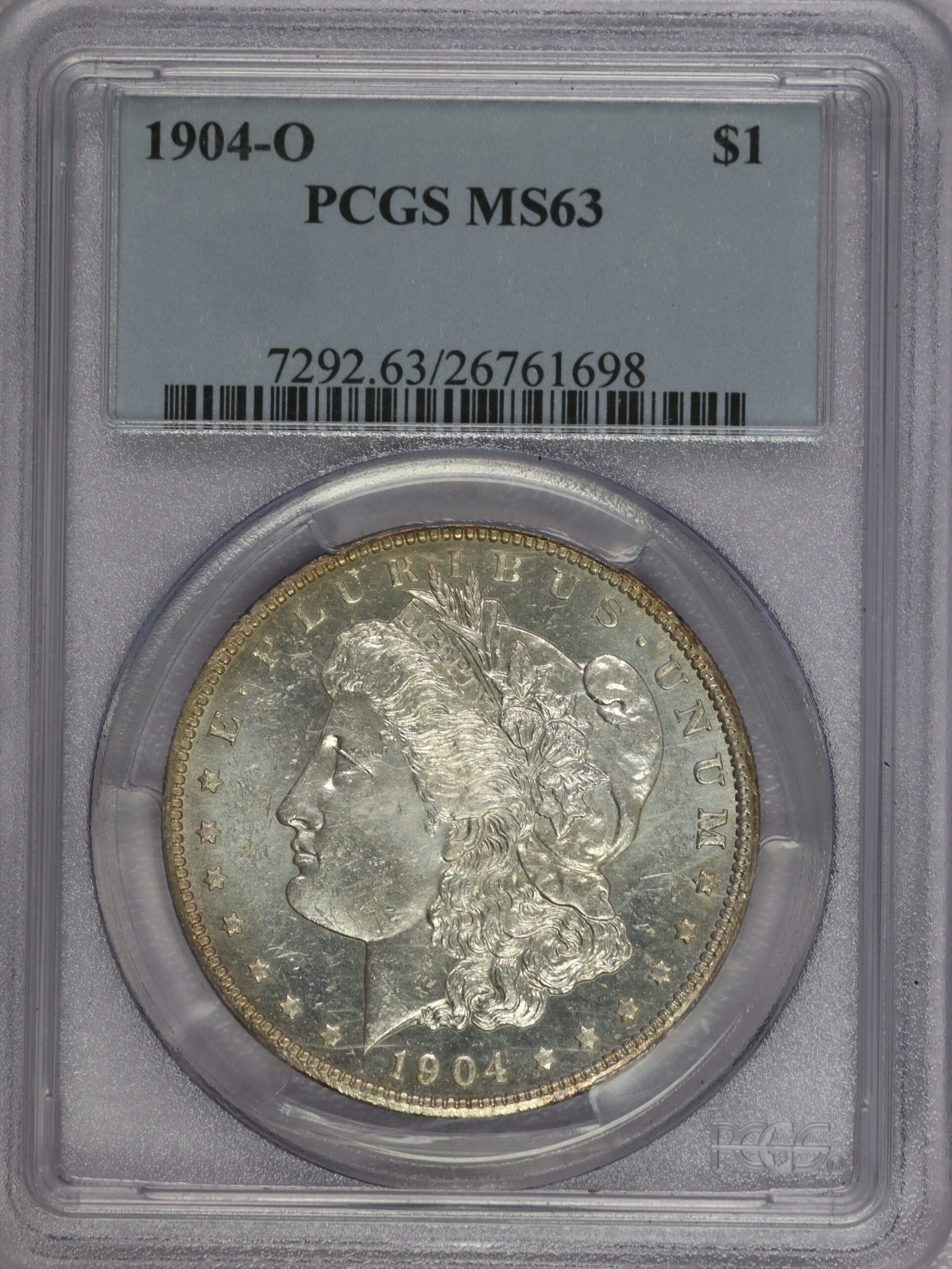 1904 O Morgan Silver Dollar PCGS MS63 Rim Toned