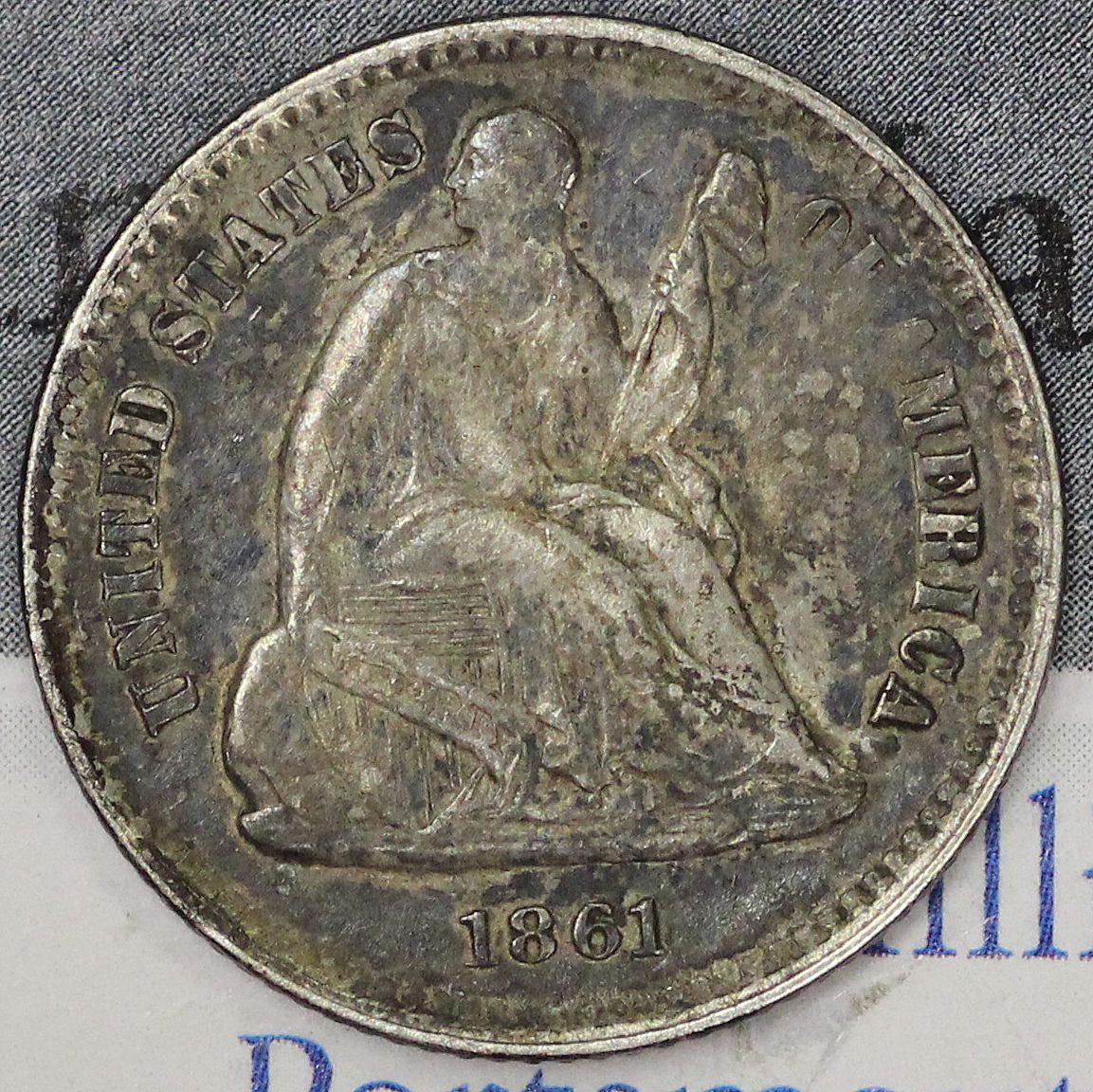 Auction - 1861 Liberty Seated Half Dime VF - Album Toning