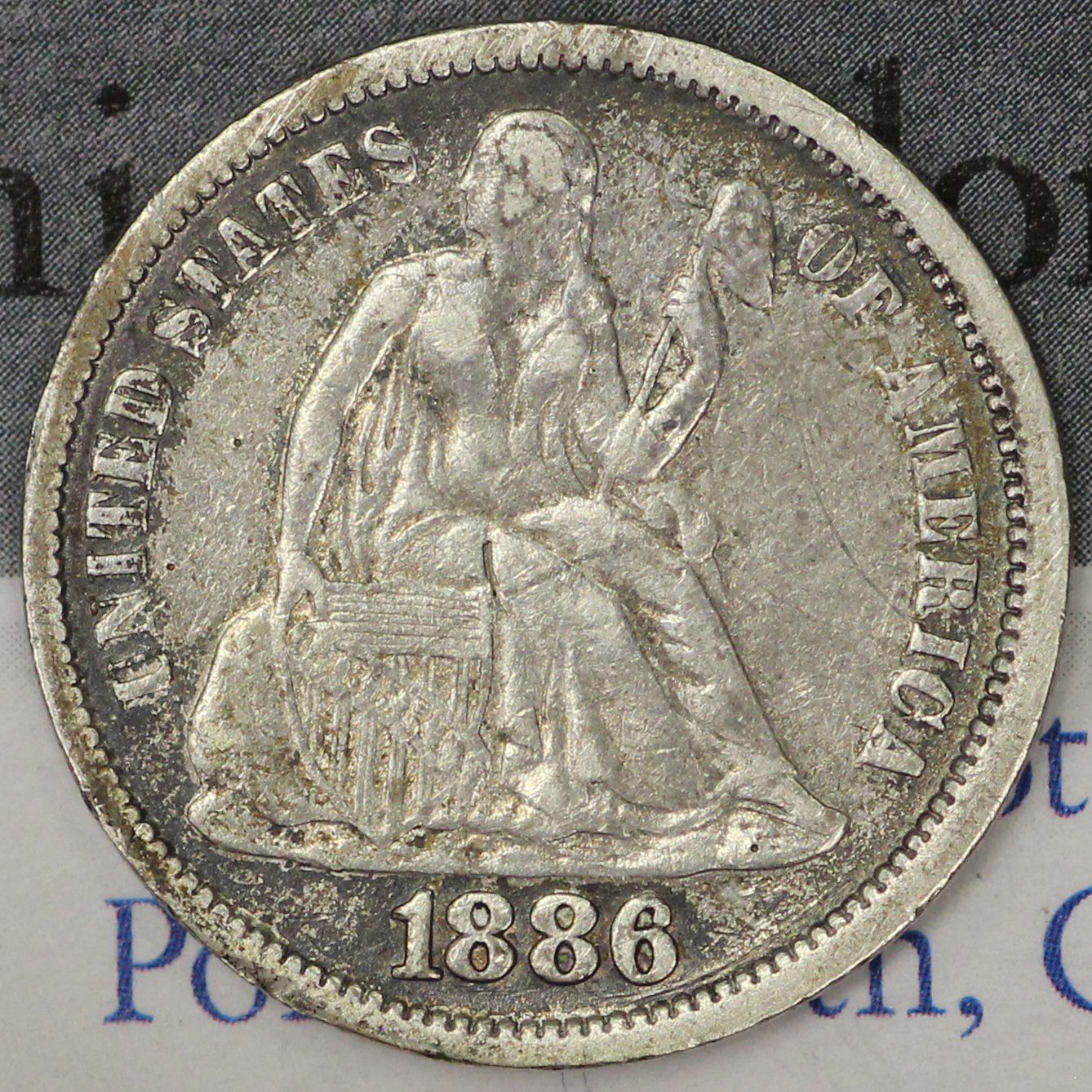 Auction - 1886 Liberty Seated Dime Scratched VF
