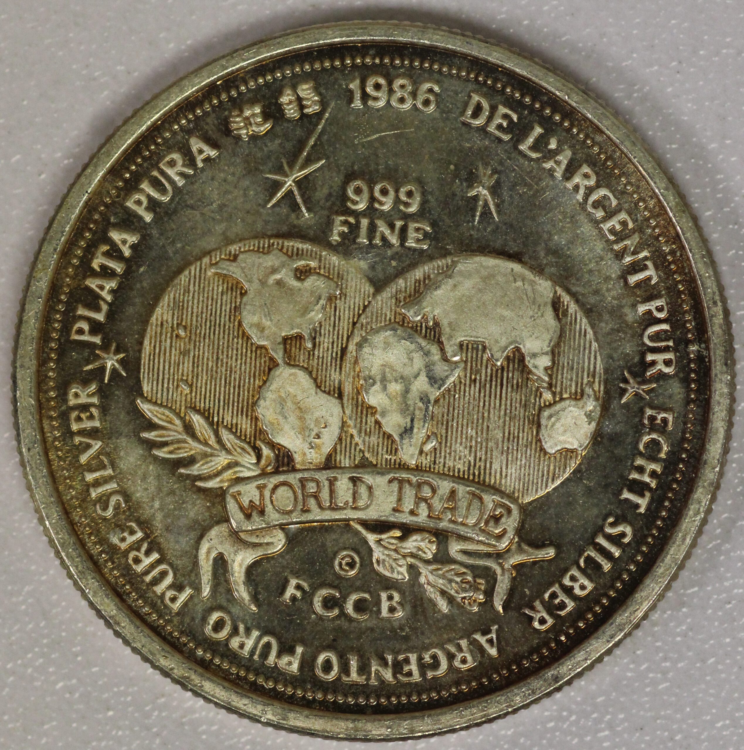 Auction – 1986 World Trade Unit Vintage Silver Round – 1 OZ .999