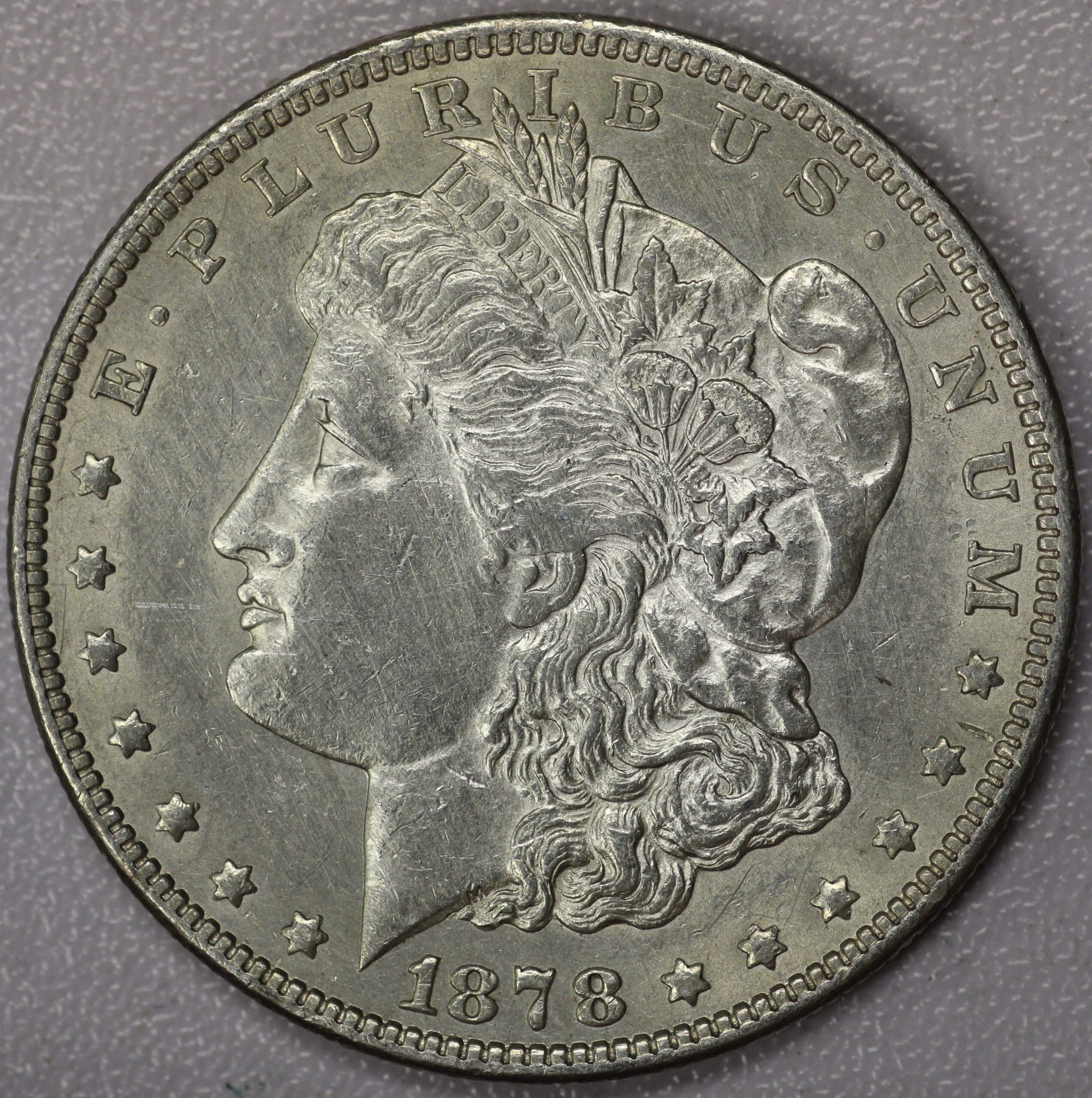 Auction - 1878 Reverse 1879 Morgan Dollar AU Cleaned