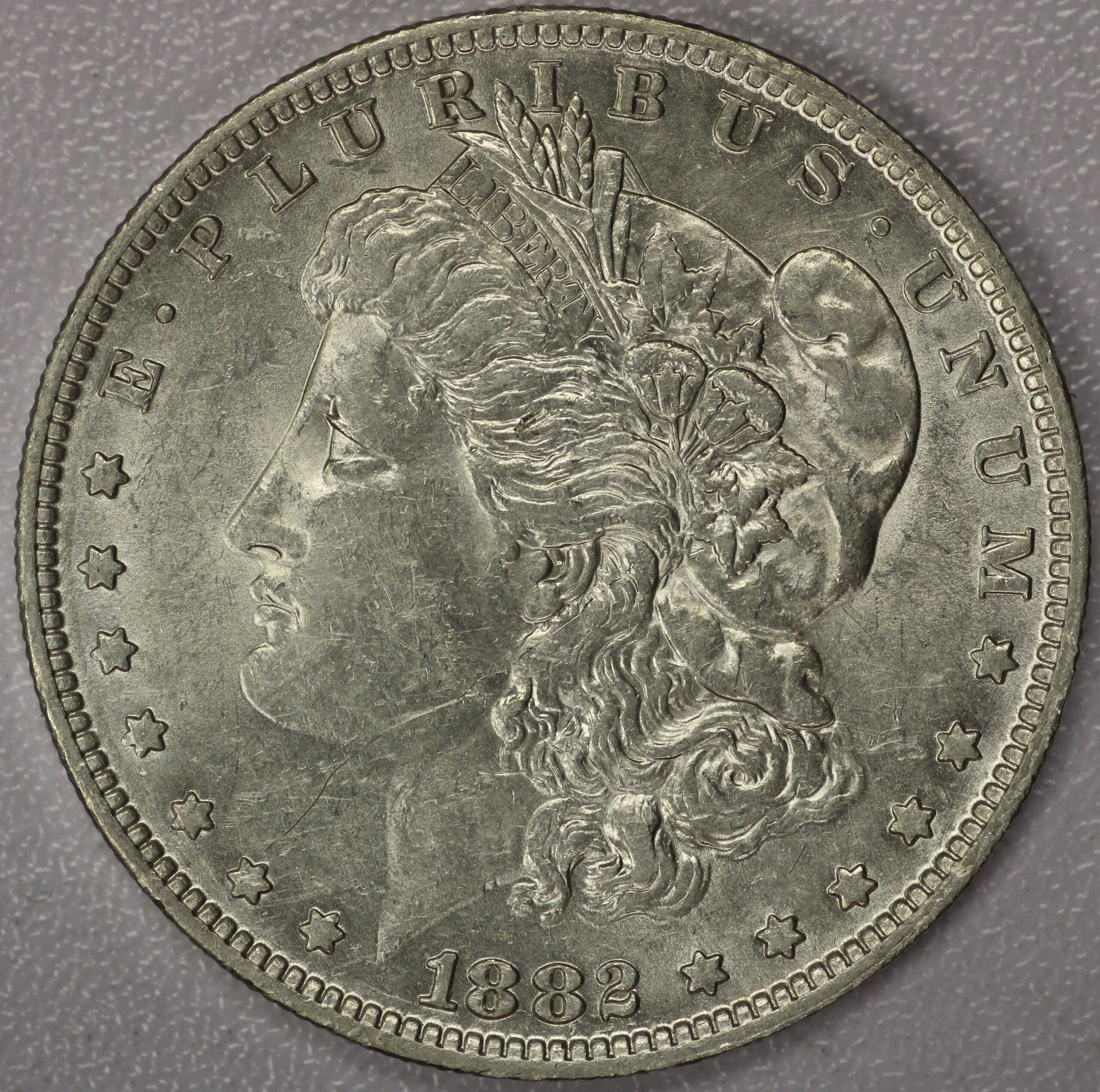 Auction - 18782 O/S Morgan Dollar EF Cleaned