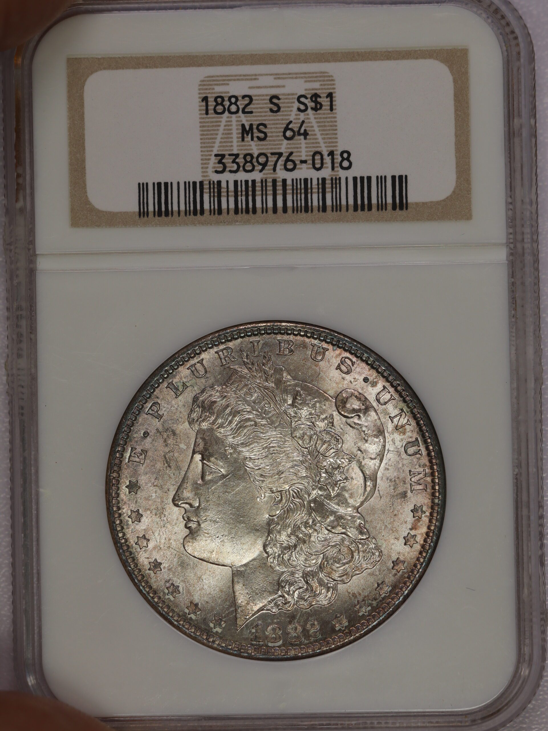 1882 S Morgan Dollar NGC MS64 Toning – Portsmouth Coin & Currency Co