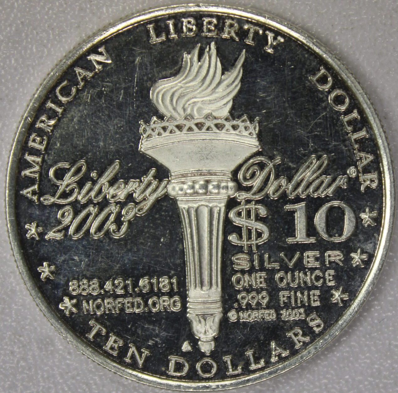 AUCTION- 2003 Norfed Silver Round One Ounce .999 Silver