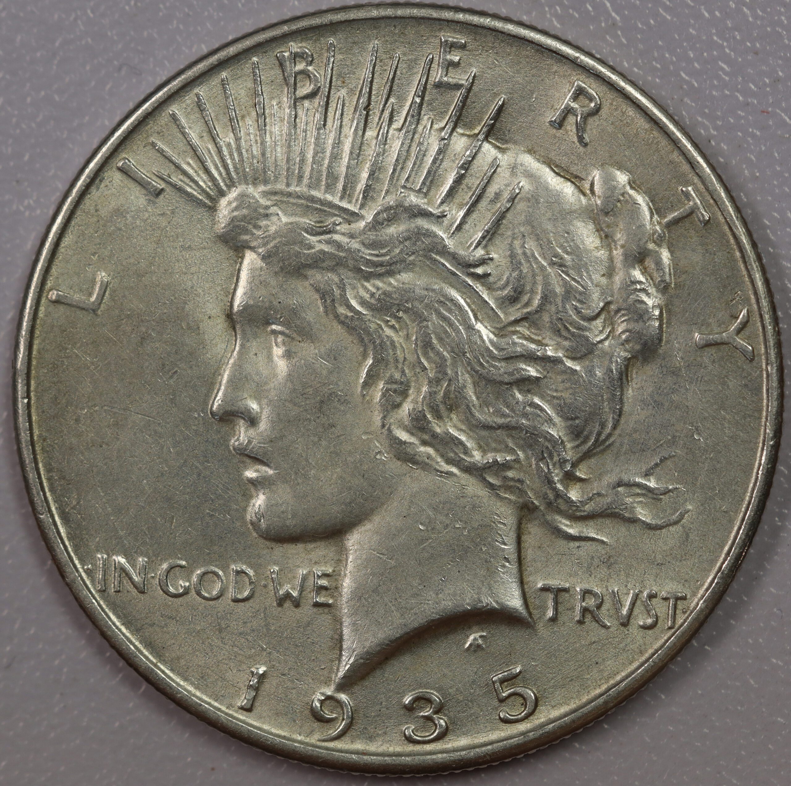 Auction- 1935 Peace Dollar AU Cleaned
