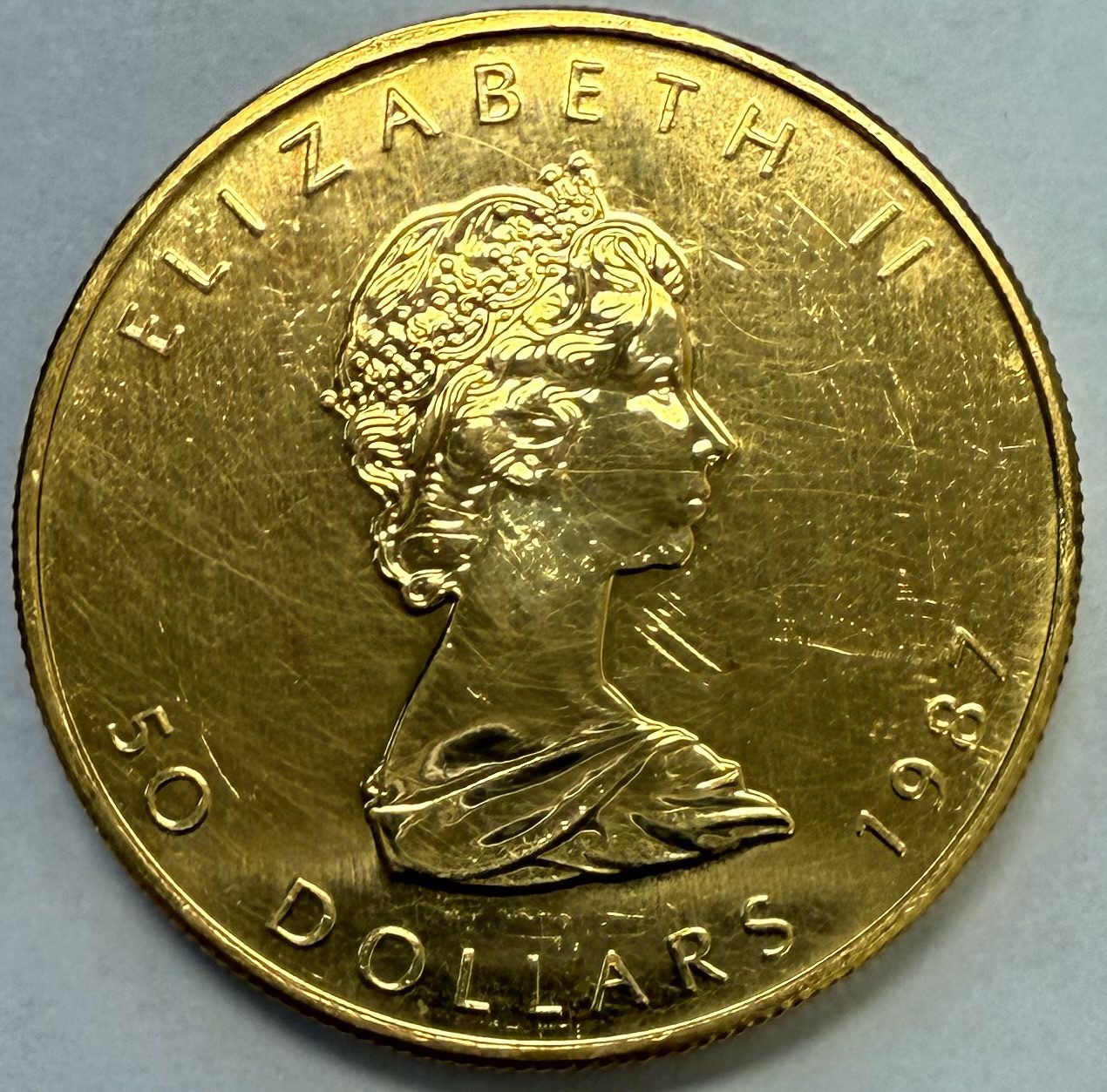 1987 Canada Gold Maple $50 One Ounce .9999 Scratched - Image 2