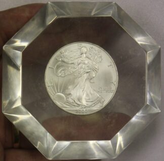 AUCTION-   2000 American Silver Eagle in a Clear Lucite Paperweight