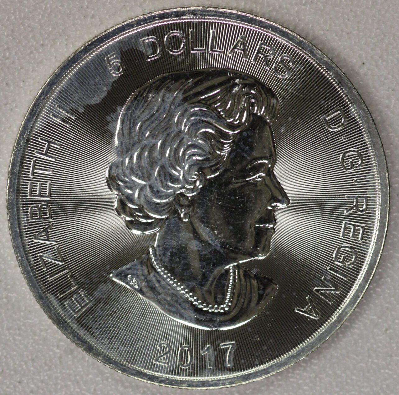 2017 Canada Lynx Cat One Troy Ounce .9999 Silver Milk Spots