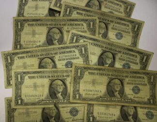 Ten (10) Well Worn 1957 Silver Certificates