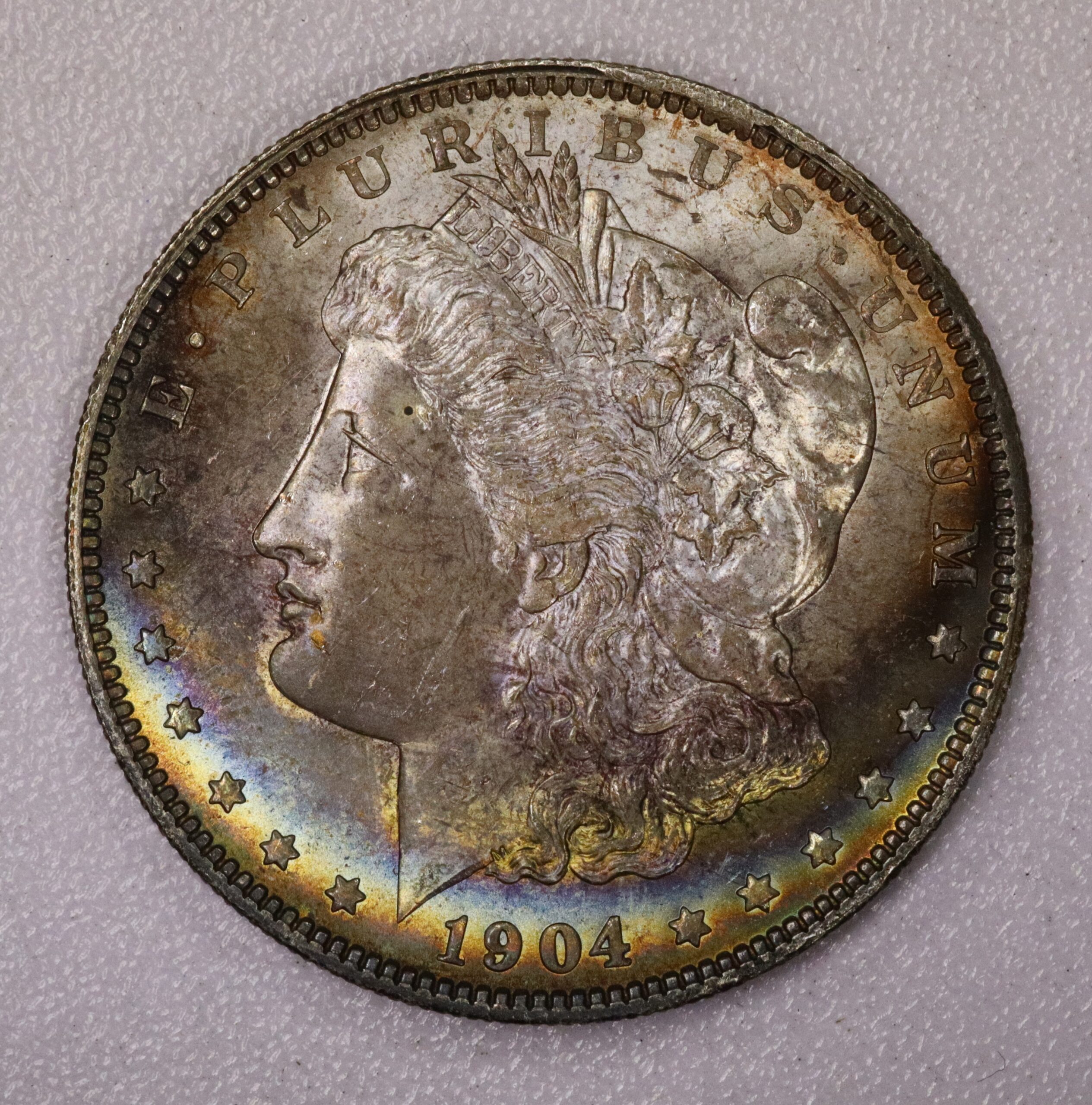 Auction - 1904-O Morgan Dollar Toned