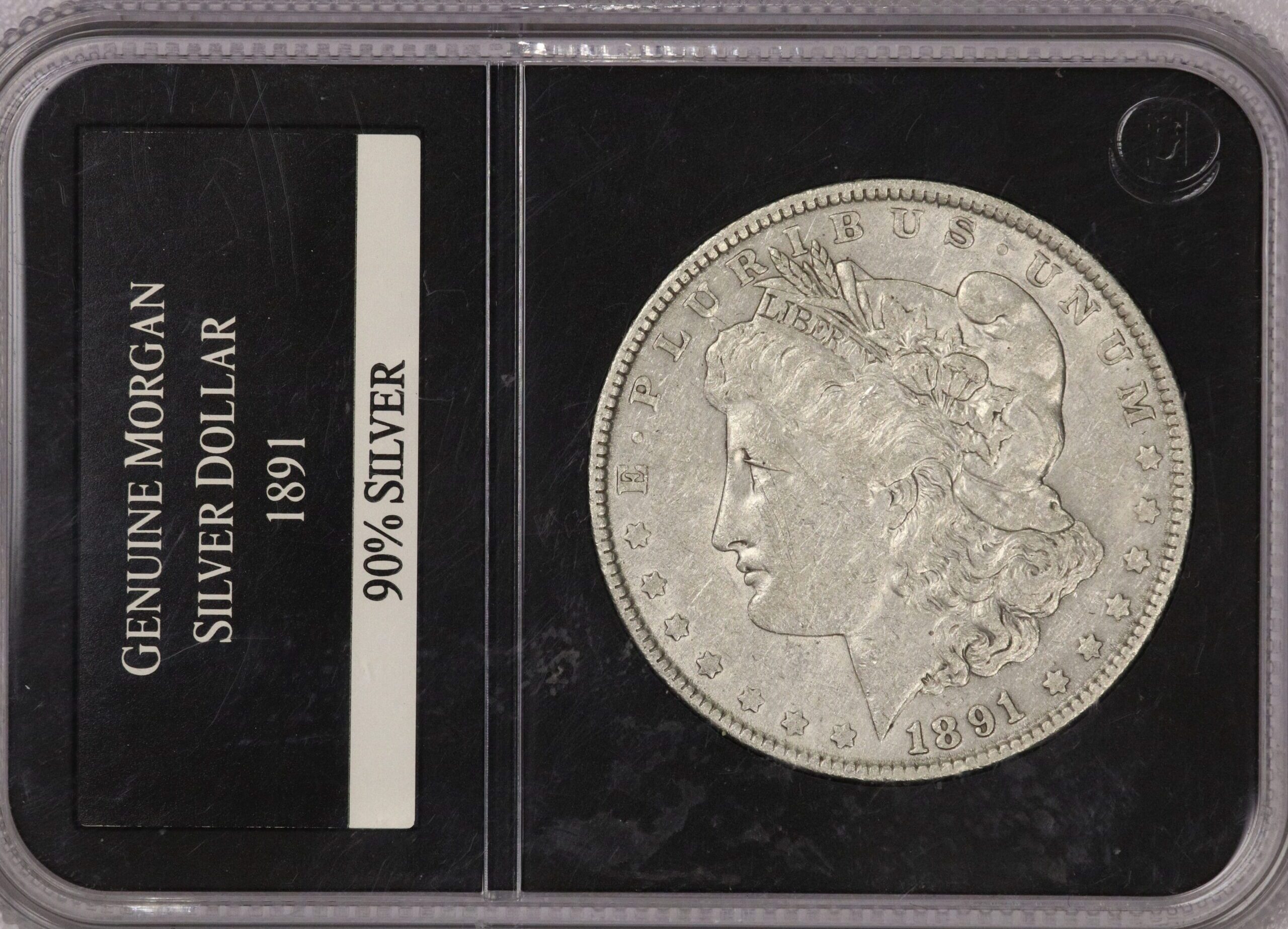 AUCTION- 1891 Morgan Silver Dollar in a Generic Slab Circulated