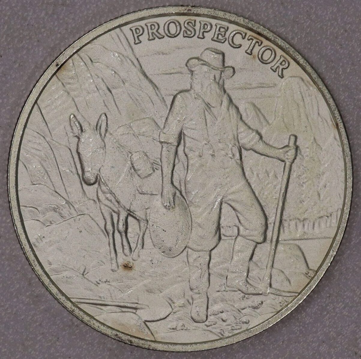 AUCTION- Prospector Silver Round .999 Silver One Troy Ounce