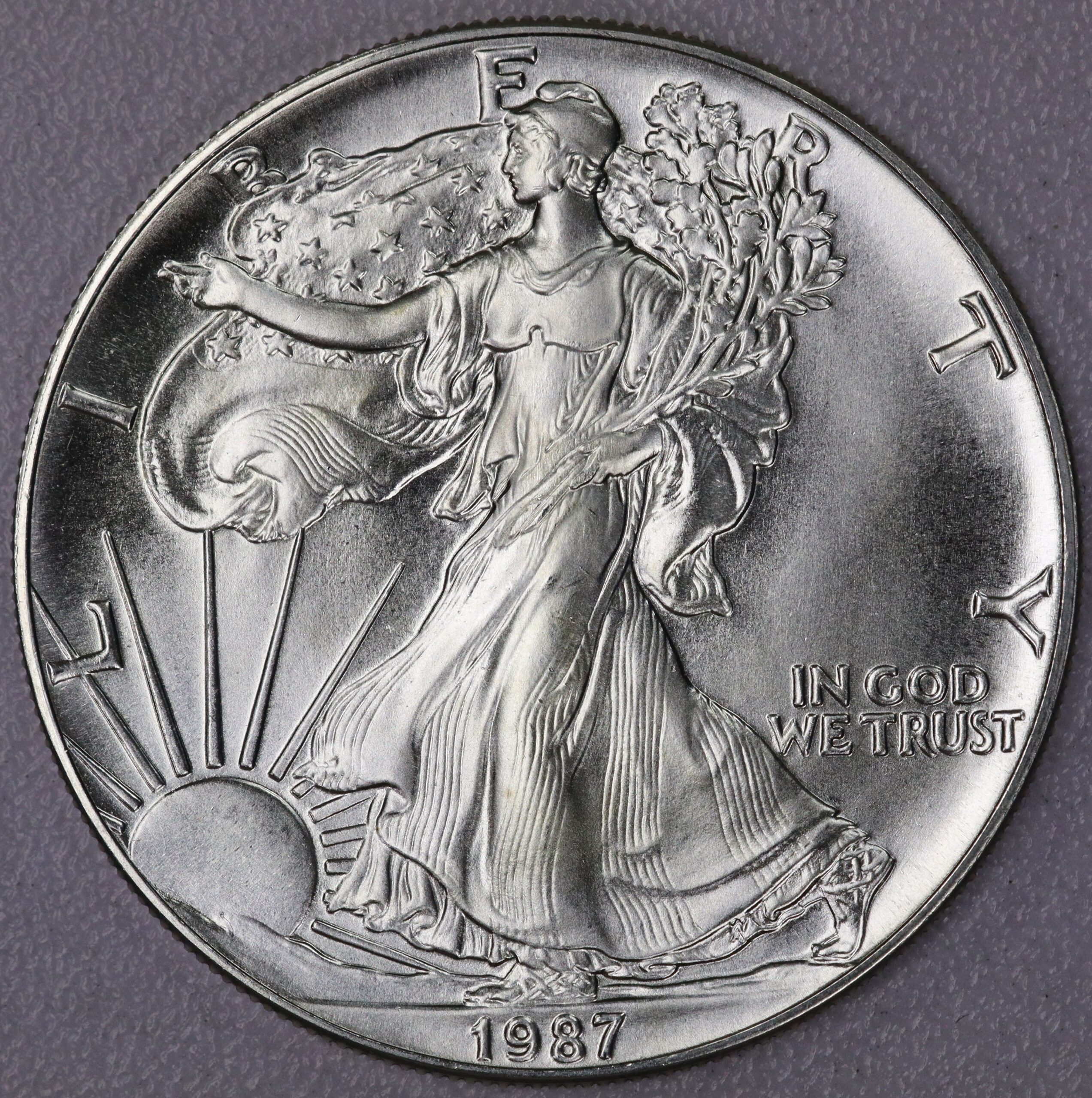 Auction – 1987 American Silver Eagle – Portsmouth Coin & Currency Co