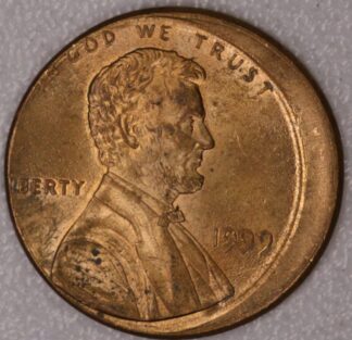 AUCTION-   1999 Lincoln Cent Struck Off Center