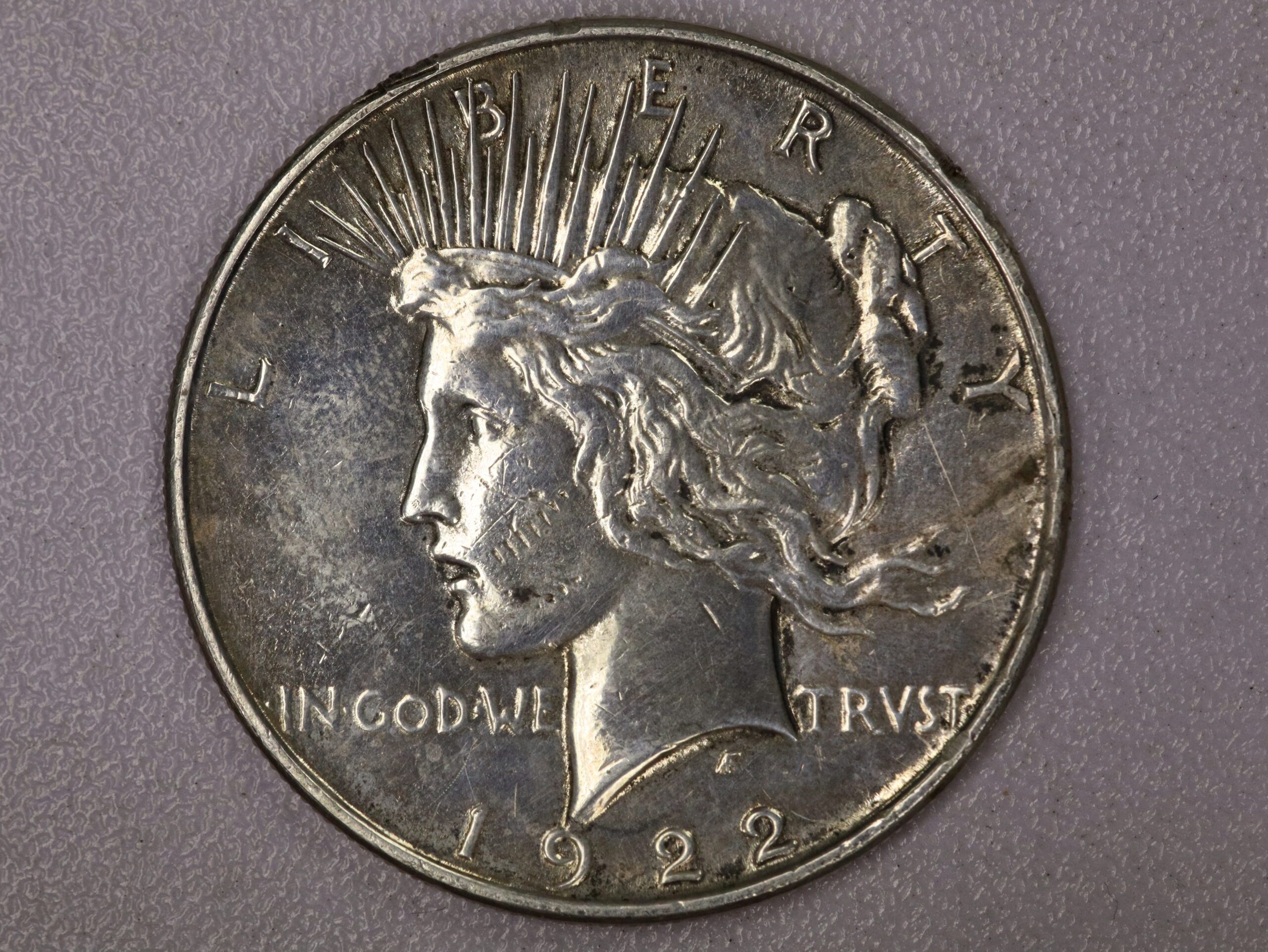 Auction- 1922 Peace Dollar Damaged and Polished