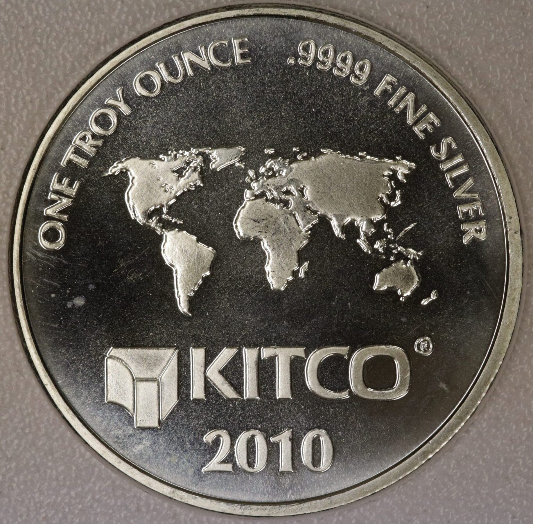 AUCTION- 2010 Kitco .9999 Fine Silver One Troy Ounce Round