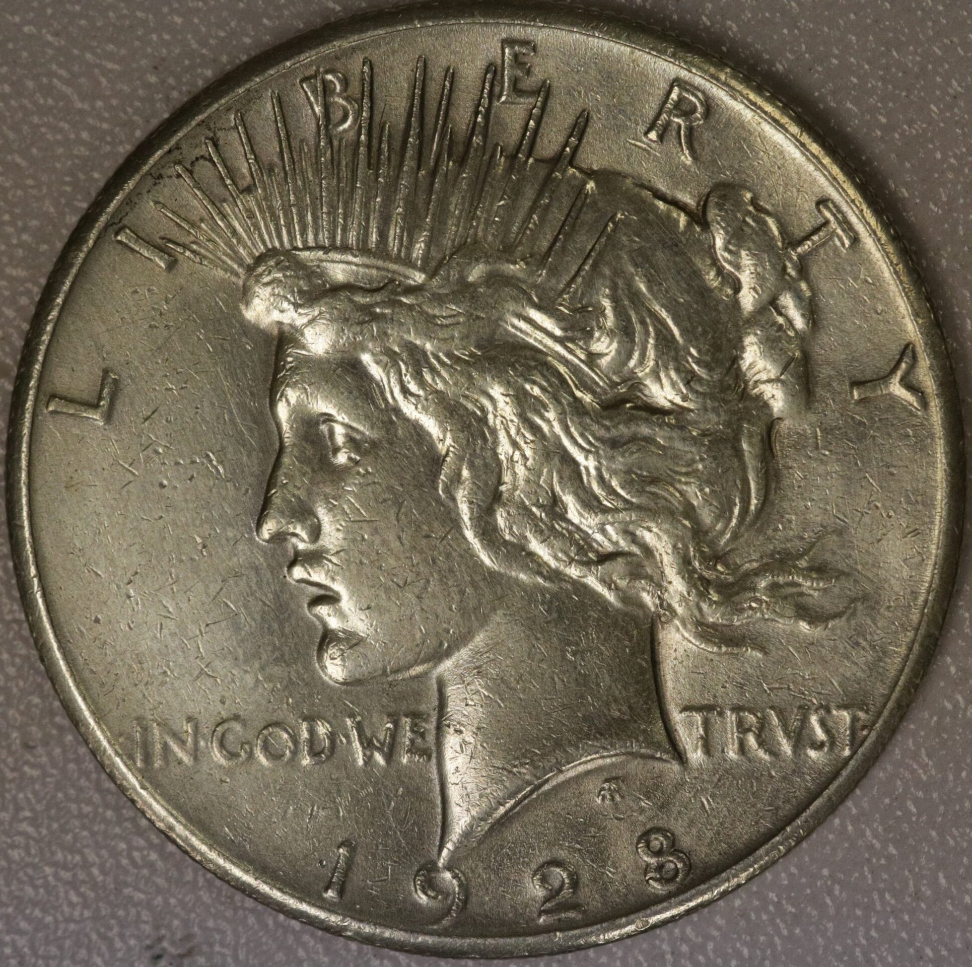 AUCTION- 1928 Peace Dollar Cleaned