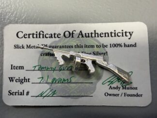 Auction-12.1 Grams .999 Silver including Tommy Gun and Five 1 Gram Rounds