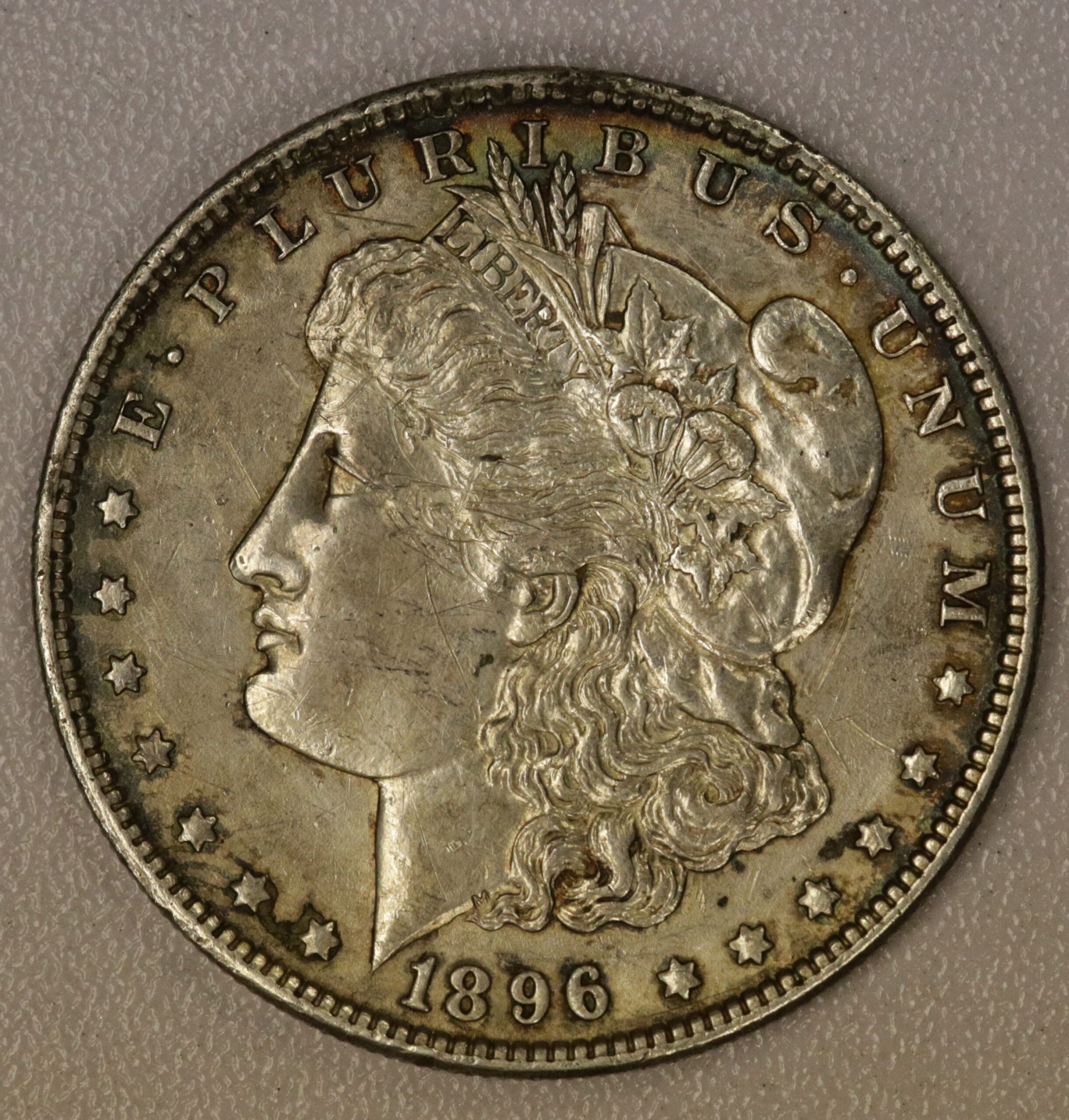 Auction- 1896 Morgan Dollar Scratched Obverse/Toning