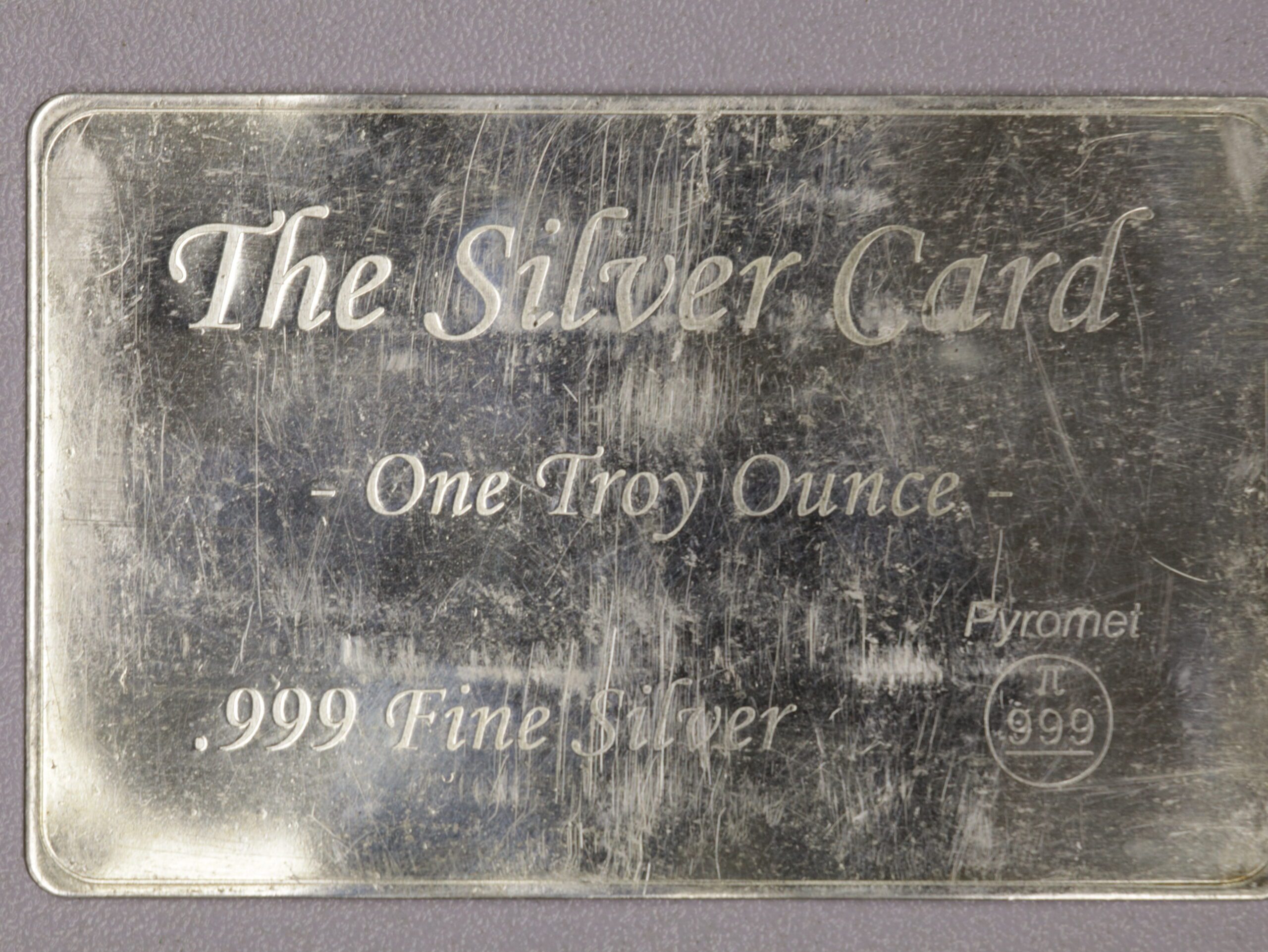 Auction-The Silver Card 1 Oz Silver Worn