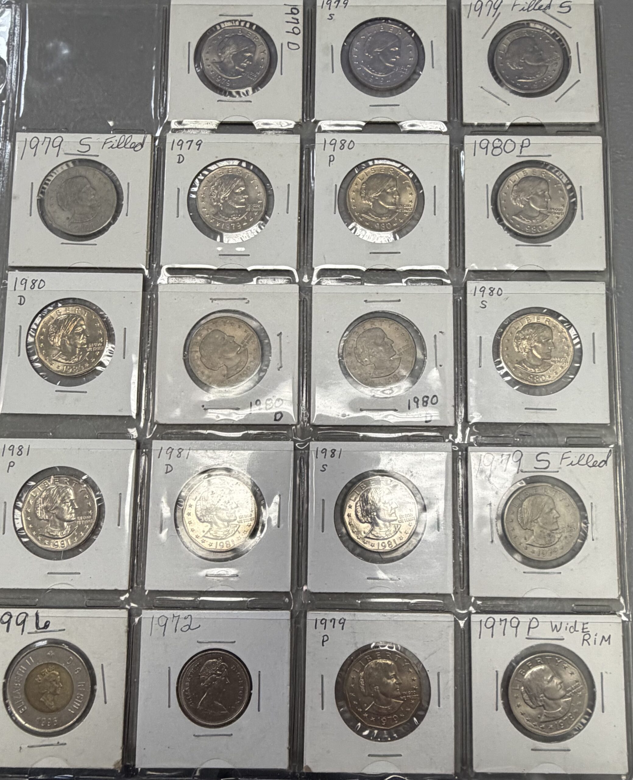 Auction-17 SBA Dollars; 1 Canadian Quarter; 1 Canadian $2 Polar Bear